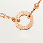Pendentif LOVE rond, 2 diamants