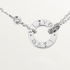 Pendentif LOVE rond, 2 diamants
