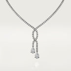 Sautoir, 2 diamants taille poire, pavé