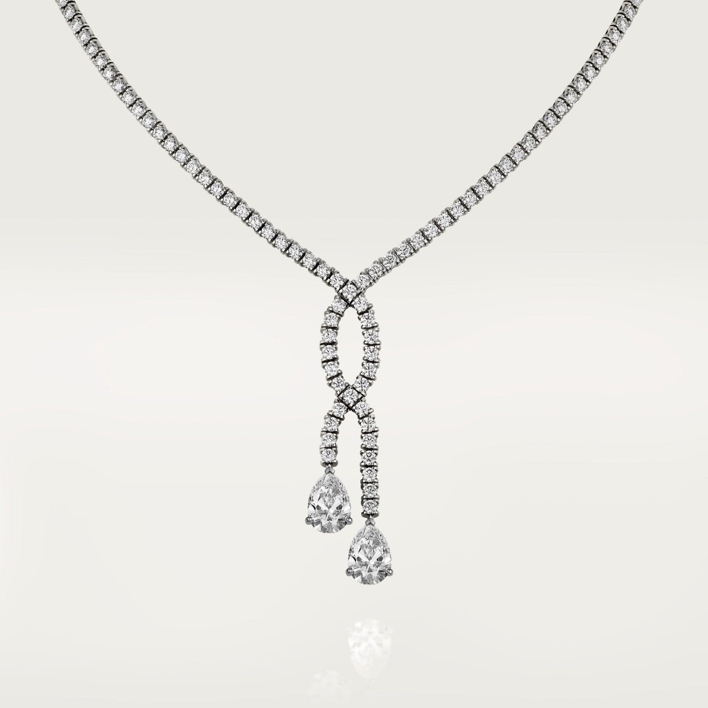 Sautoir, 2 diamants taille poire, pavé