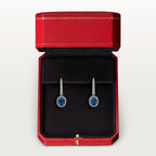 Boucles d'oreilles dormeuses Cartier Destinée, 2 saphirs taille ovale, pavées