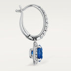 Boucles d'oreilles dormeuses Cartier Destinée, 2 saphirs taille ovale, pavées