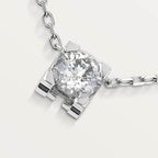 Pendentif C de Cartier, diamant taille brillant