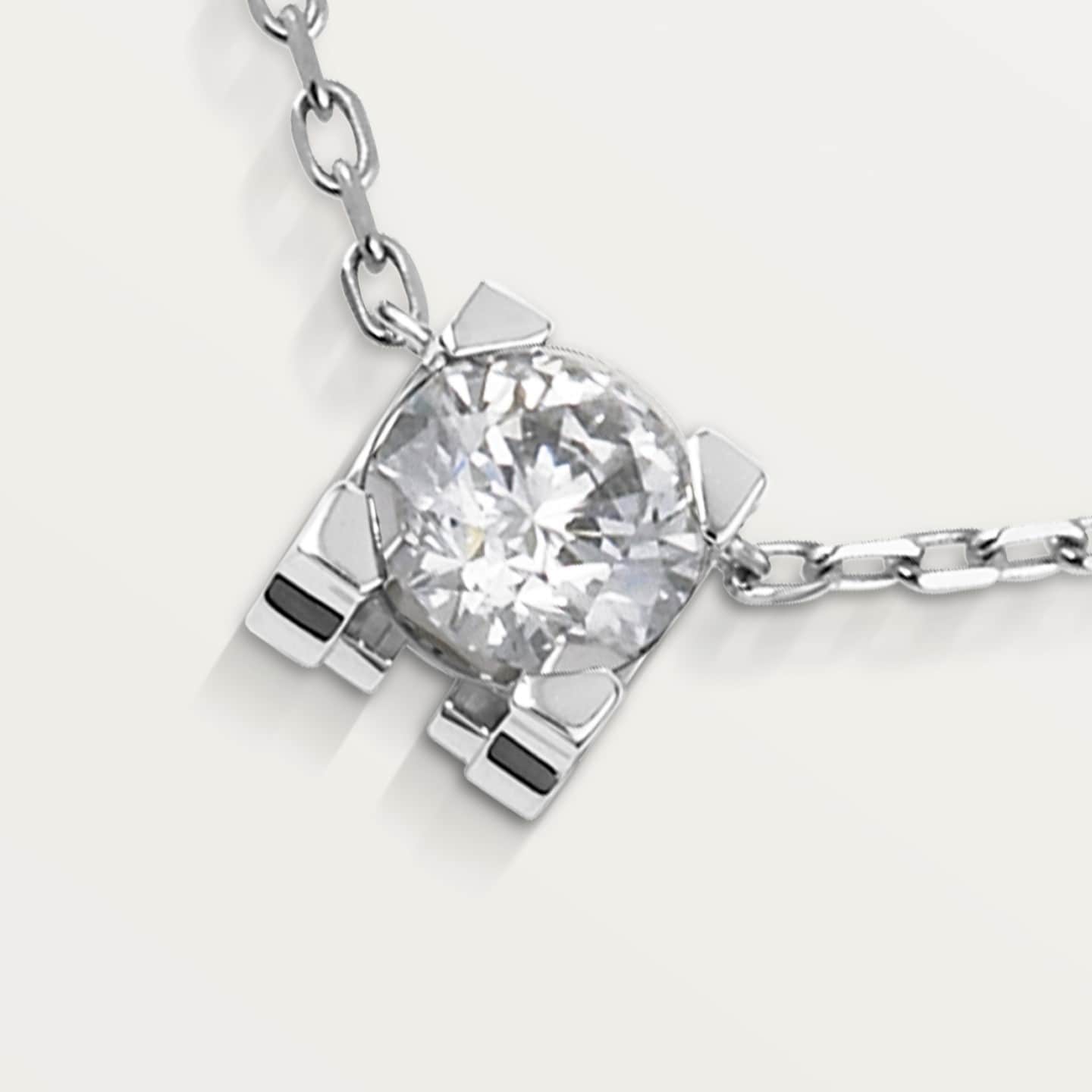 Pendentif C de Cartier, diamant taille brillant