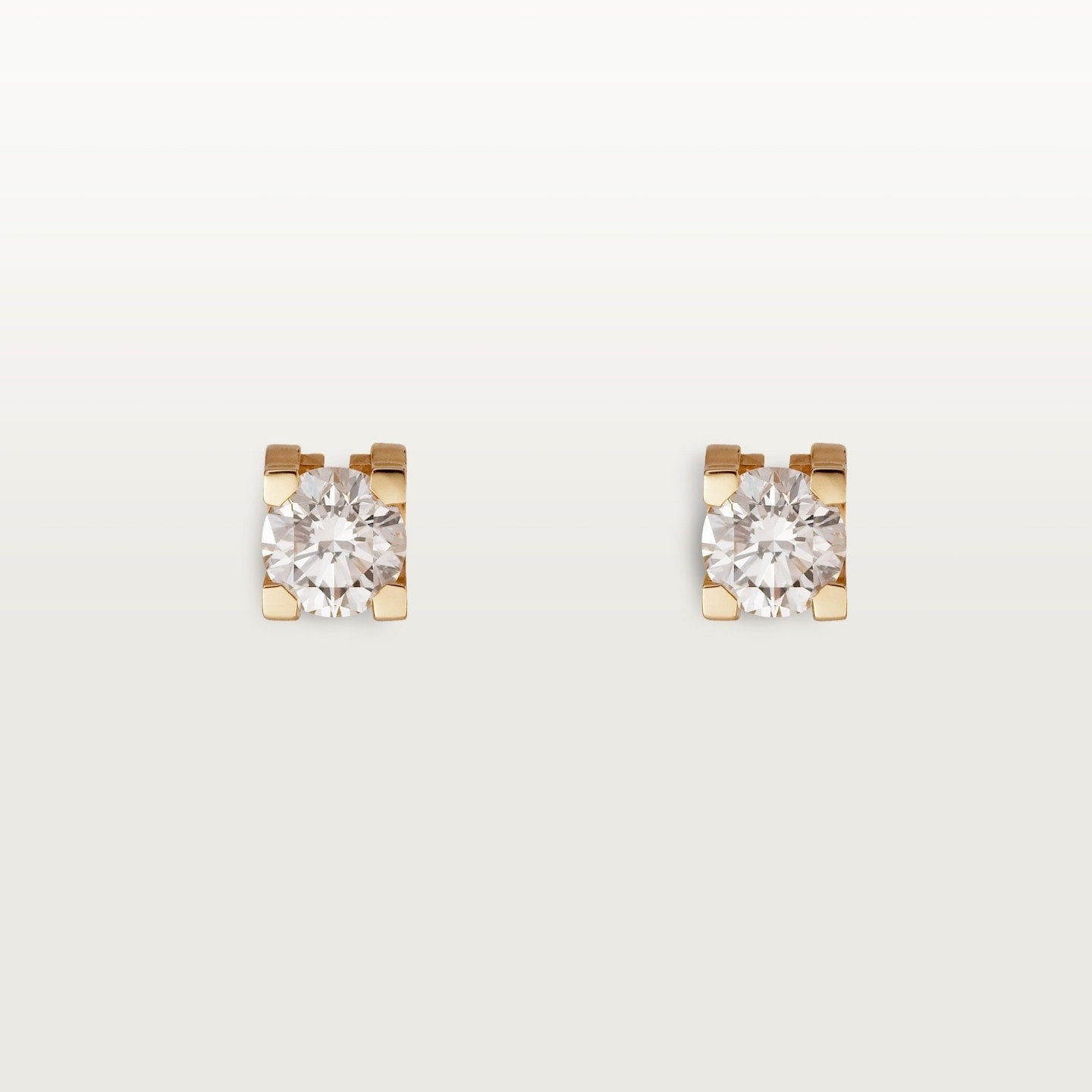 Puces d'oreilles C de Cartier, 2 diamants taille brillant
