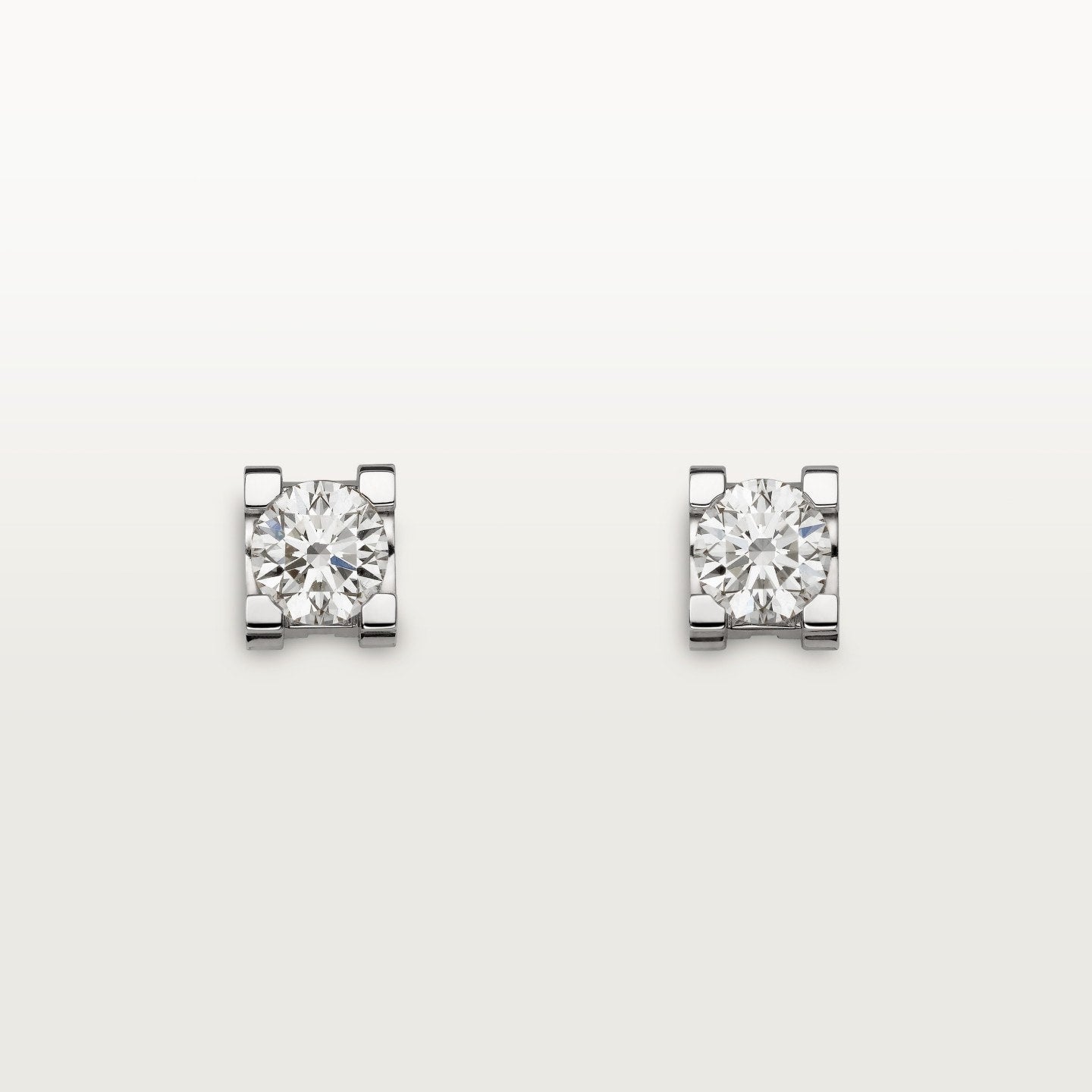 Puces d'oreilles C de Cartier, 2 diamants taille brillant