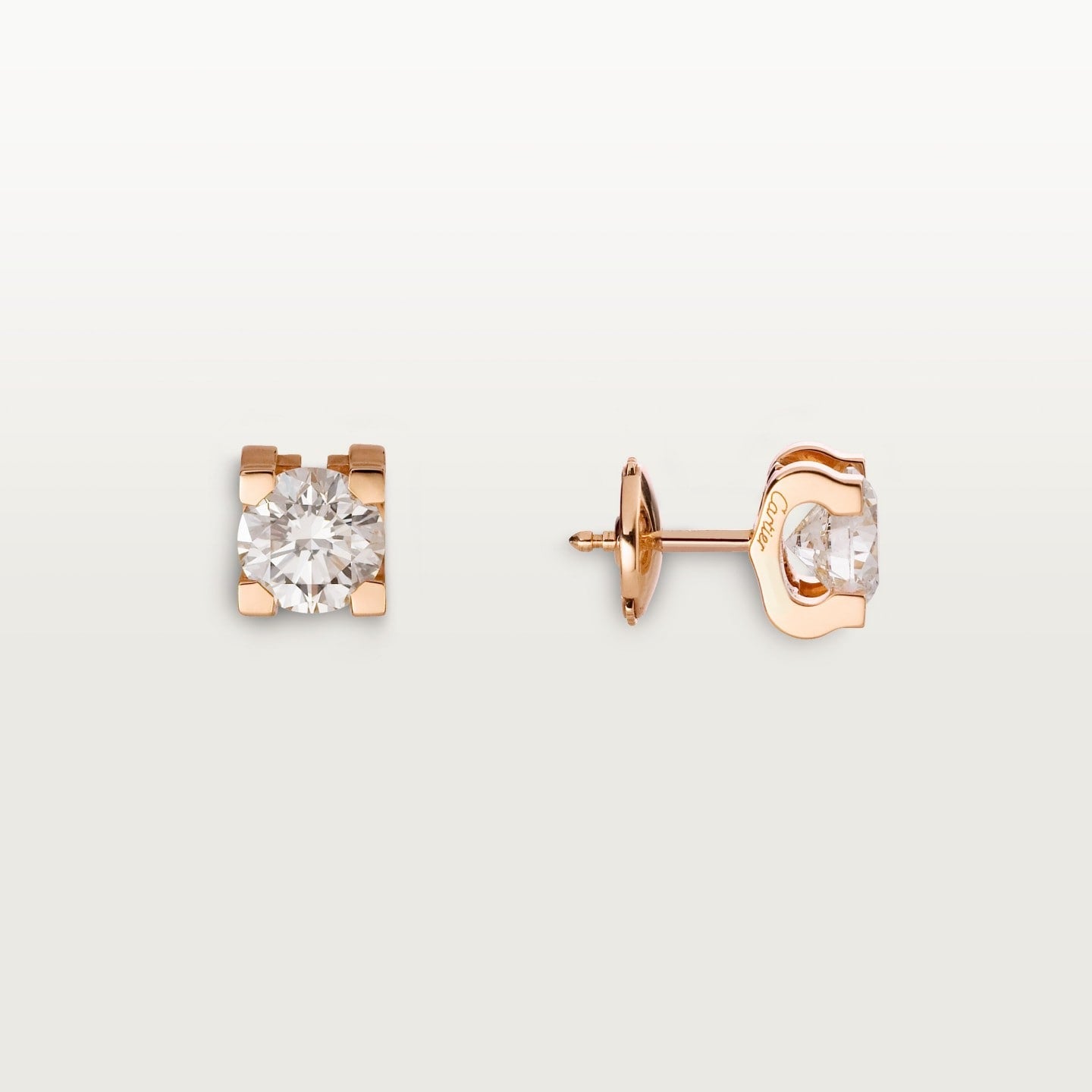 Puces d'oreilles C de Cartier, 2 diamants taille brillant