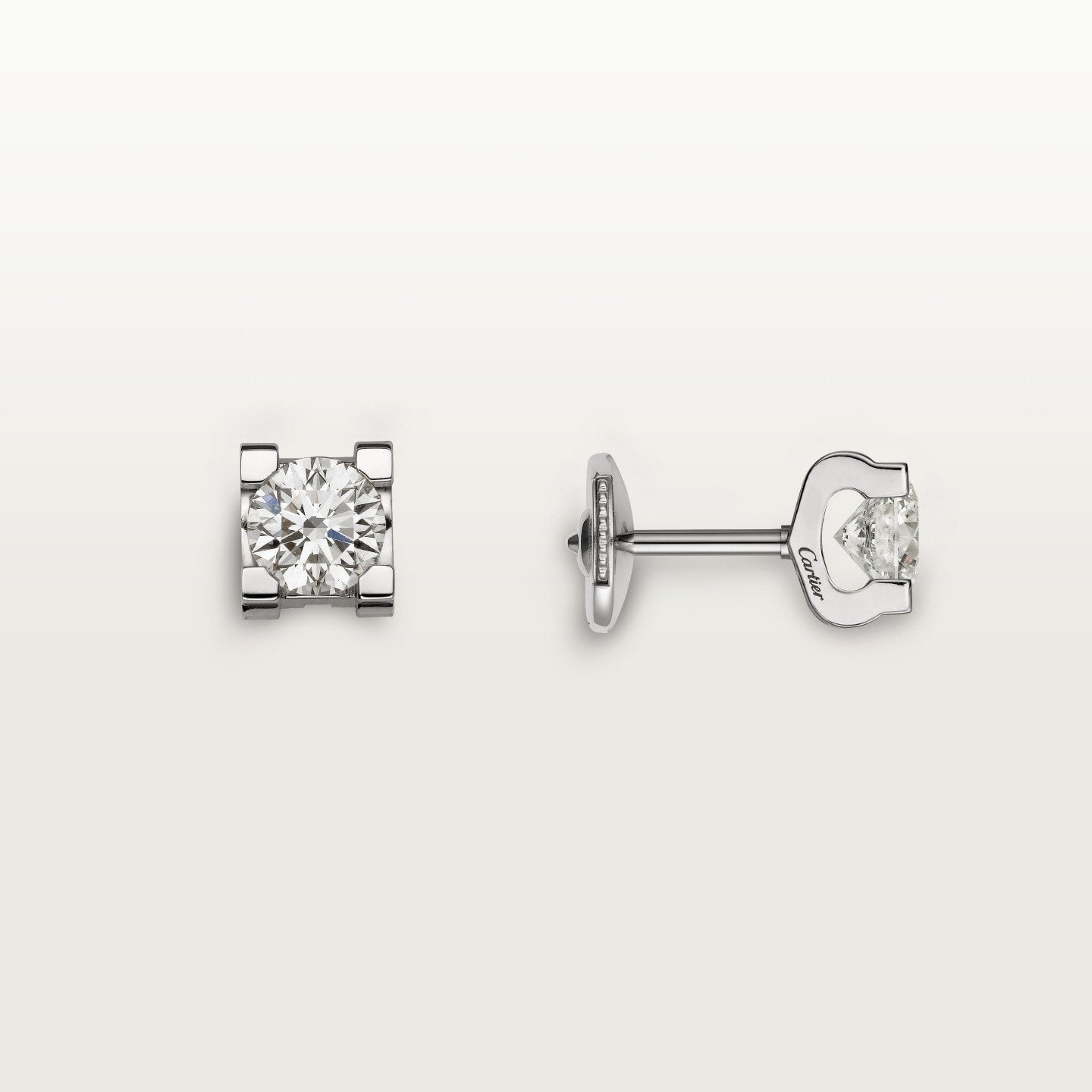 Puces d'oreilles C de Cartier, 2 diamants taille brillant