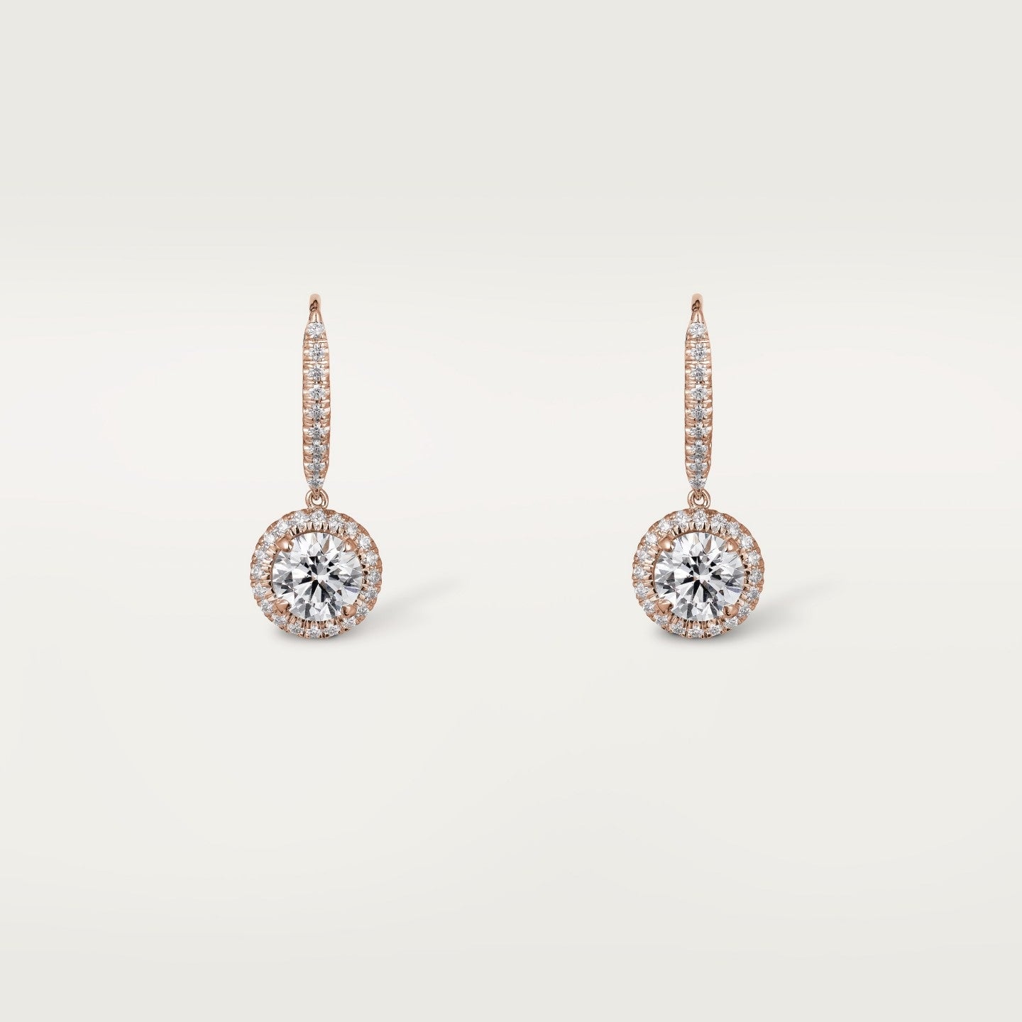 Boucles d'oreilles dormeuses Cartier Destinée, 2 diamants taille brillant, pavées