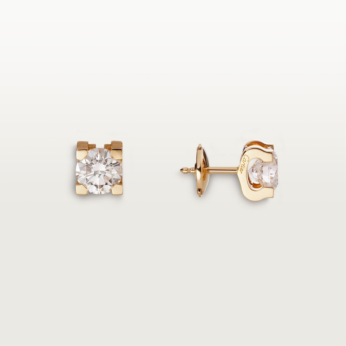 Puces d'oreilles C de Cartier, 2 diamants taille brillant