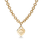Collier Plaque Cœur en or jaune 18 carats. Medium.