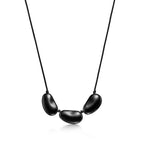 Collier Bean en bois japonais recouvert de laque noire