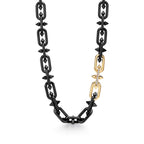 Collier en titane, or 18 carats et diamants