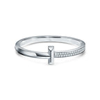 Bracelet jonc à charnière large T1 orné de diamants en or blanc 18 carats