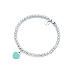 Bracelet de perles Plaque Cœur Tiffany Blue® en argent 925 millièmes. 4 mm.