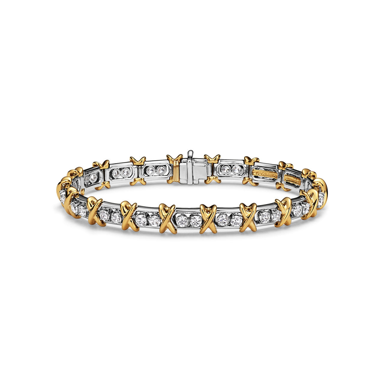 Bracelet en platine 950 millièmes, or jaune et diamants