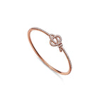 Bracelet à charnière en or rose 18 carats et diamants