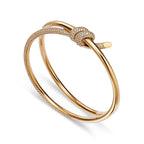 Bracelet jonc double rang à charnière en or jaune 18 carats et diamants