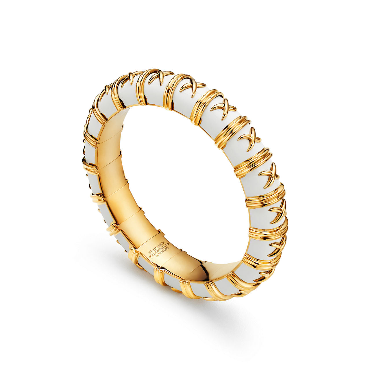 Bracelet en or jaune et émail blanc