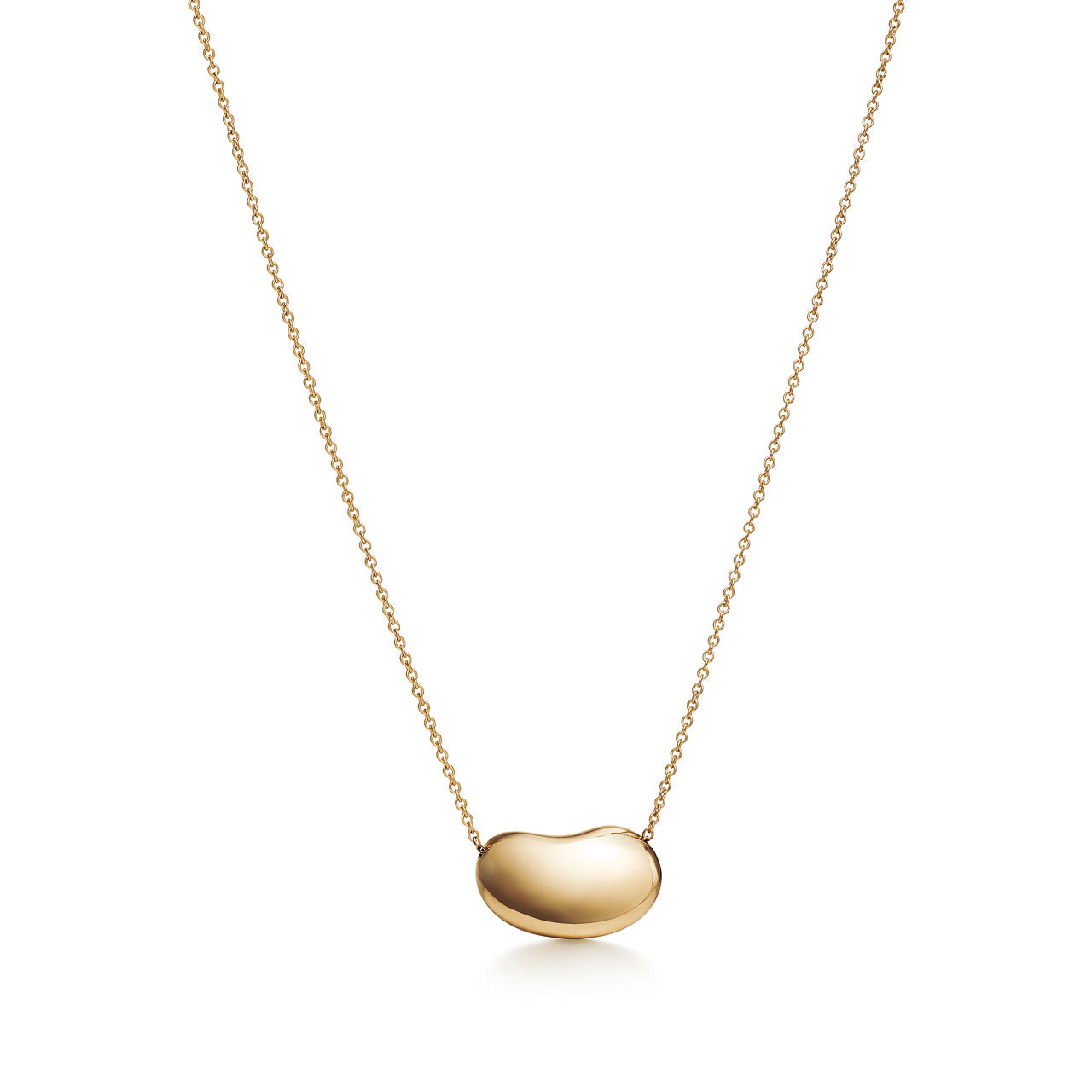 Pendentif Bean design en or jaune 18 carats. 18 mm.