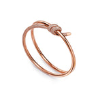 Bracelet jonc double rang à charnière en or rose 18 carats et diamants