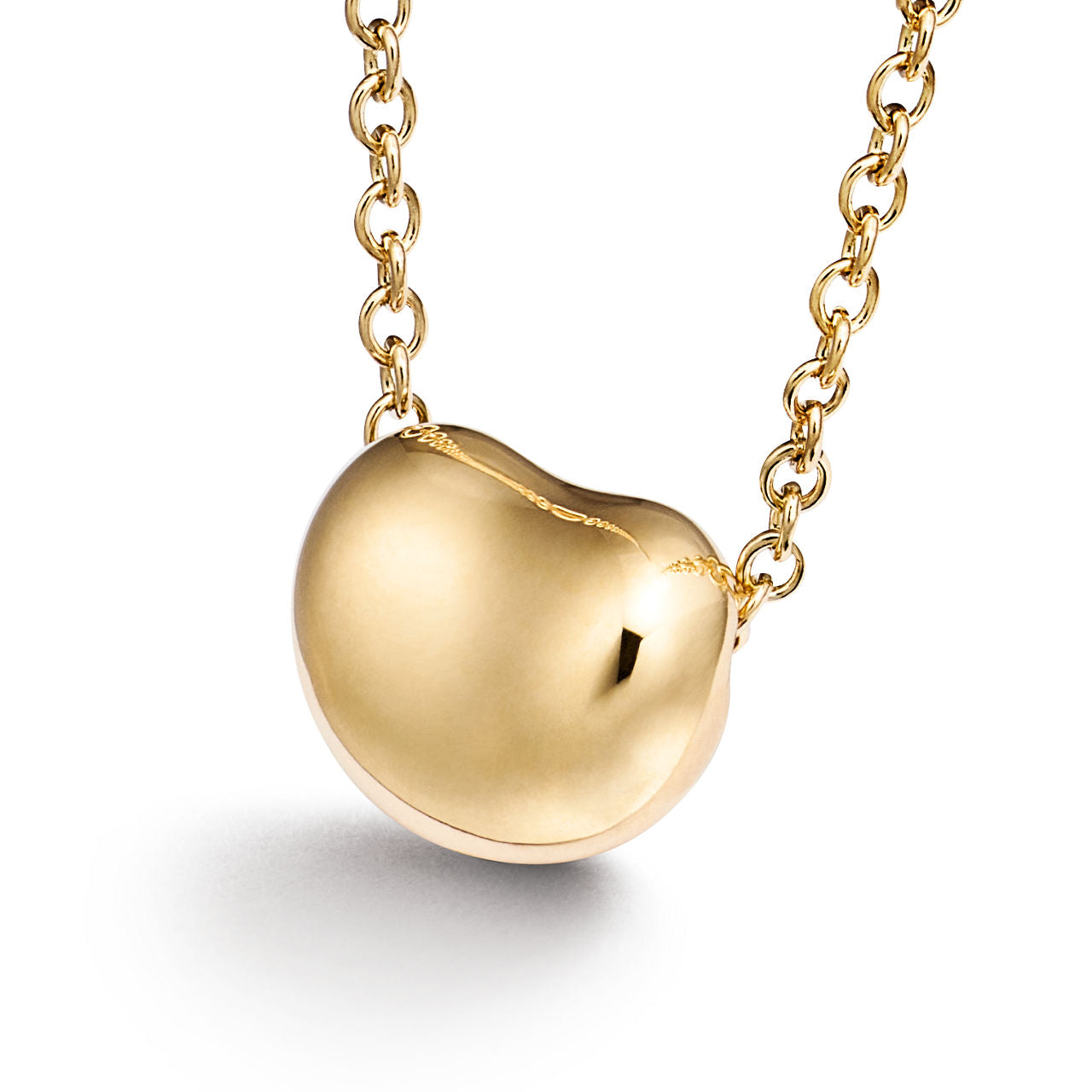 Pendentif Bean design en or jaune 18 carats. 6.5 mm.