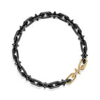 Collier en titane, or 18 carats et diamants