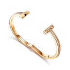 Bracelet jonc à charnière large T1 orné de diamants en or jaune 18 carats