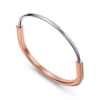 Bracelet jonc étroit en or rose et blanc 18 carats et pavé de diamants demi-cercle