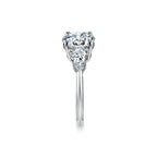 Tiffany Trois pierres Bague de fiançailles en platine 950 millièmes ornée de pierres latérales taille poire
