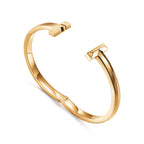 Bracelet jonc à charnière large T1 en or jaune 18 carats