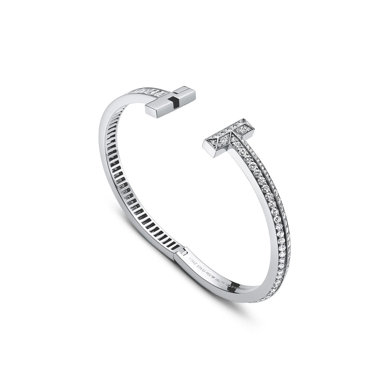 Bracelet jonc T1 en or blanc, diamants pavés et taille baguette