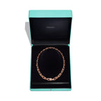 Collier à maillons gradués en or rose et diamants