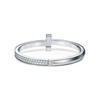 Bracelet jonc à charnière large T1 orné de diamants en or blanc 18 carats