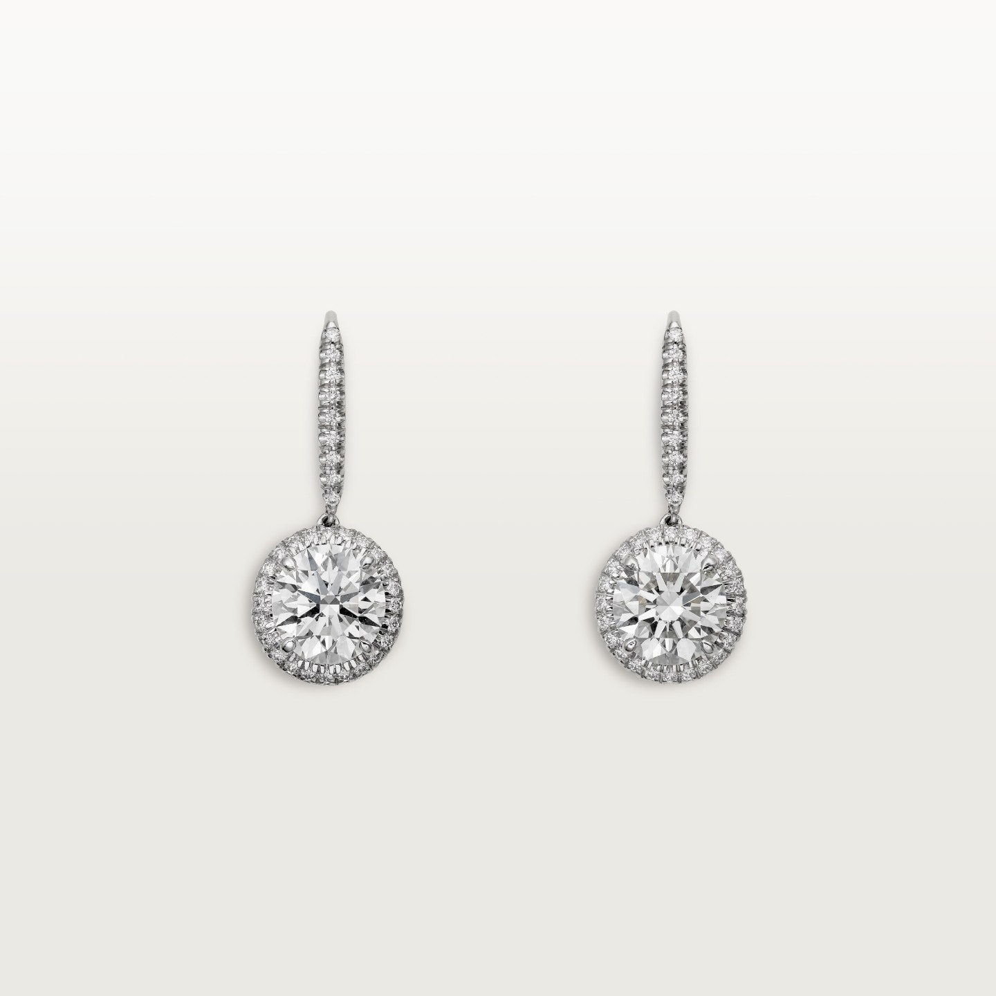 Boucles d'oreilles dormeuses Cartier Destinée, 2 diamants taille brillant, pavées
